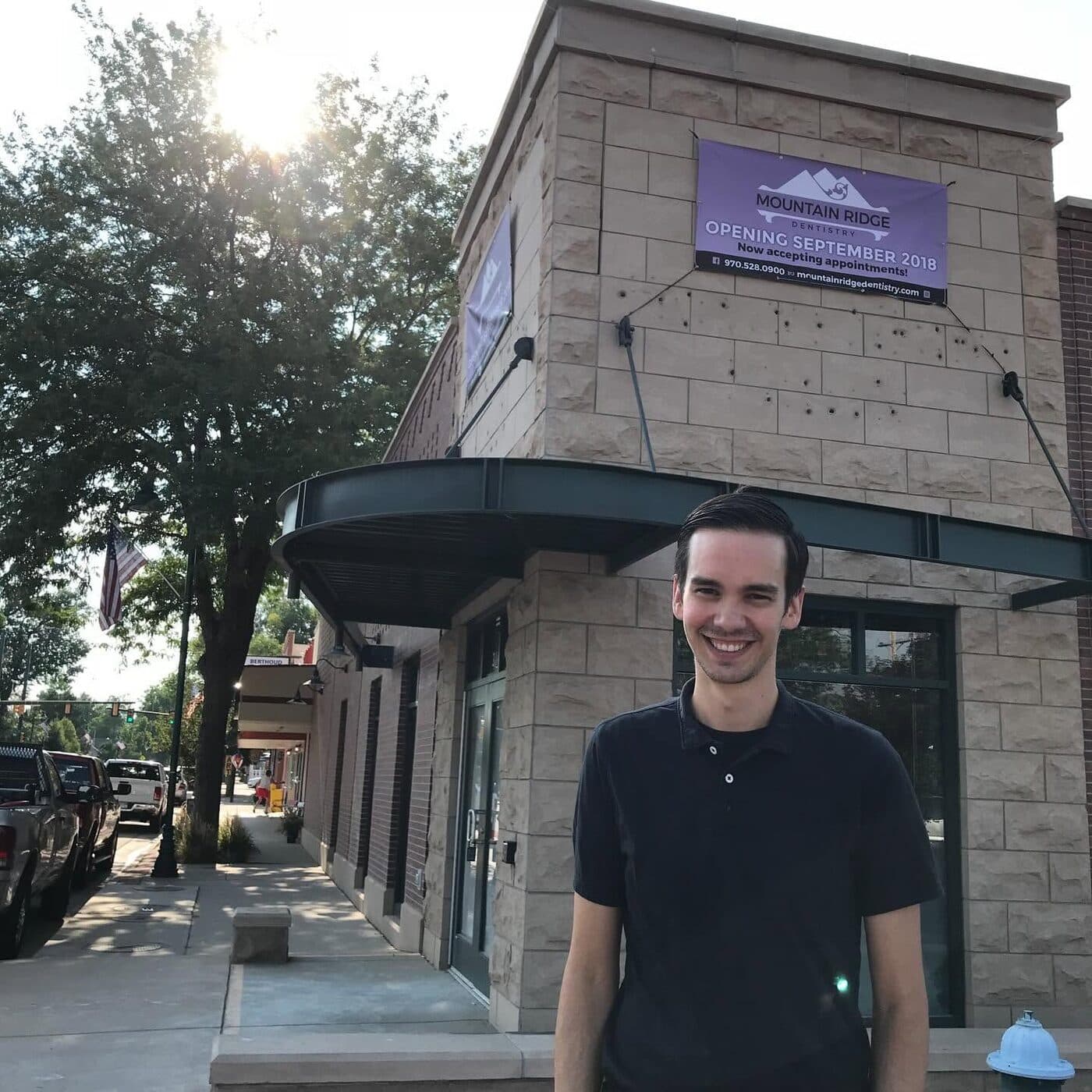 Dr. Austin DePorter outside the Mountain Ridge Dentistry building